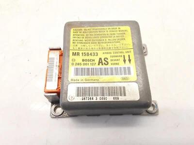 Mitsubishi Carisma 1998 Safety Equipment Control Unit Module ECU 0285001127 - Imagen 1 de 4