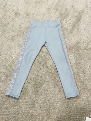 Pantalones leggings Guess azul claro para niña pequeña talla 5 Foto 1 de 2