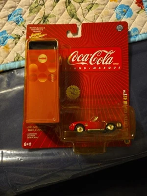 JOHNNY LIGHTNING 1965 SHELBY COBRA 427 w/COCA COLA COLLECTOR TIN  1/64 - Image 1 of 4