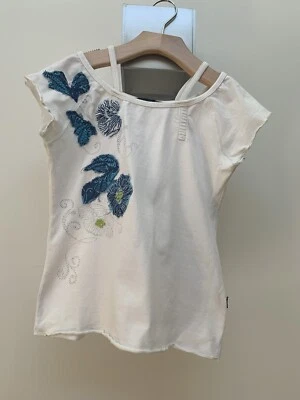 Camiseta blanca de algodón Jean Bourget de diseñador francés con detalles florales azules  Foto 1 de 4