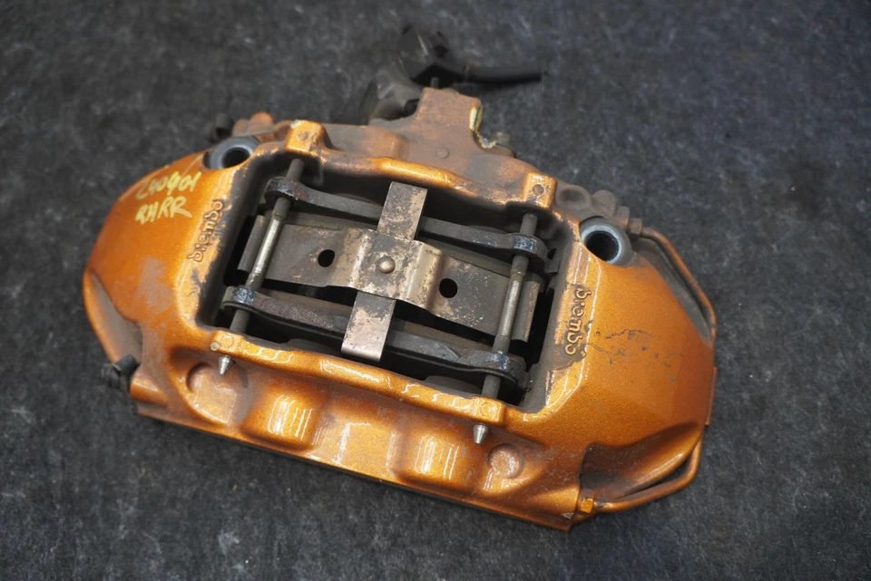 Pinza de freno trasera derecha 44001JF20D OEM Nissan GT-R 2010-21 *Nota Foto 1 de 4