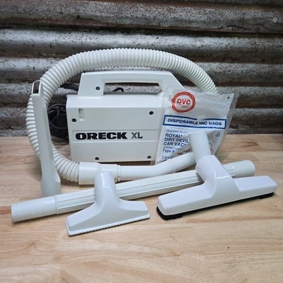 Aspiradora portátil Oreck XL blanca con accesorios BB870-AW Foto 1 de 4