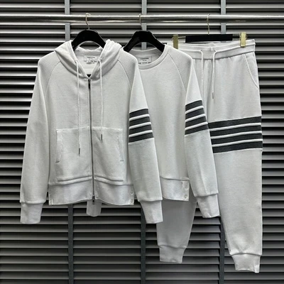 Thom Browne Hombre/Mujer Primavera Clásico Cuatro Barras Cremallera Capucha Cárdigan Conjunto Suéter. Foto 1 de 4