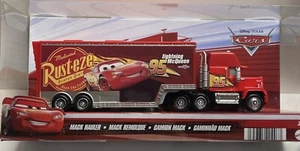 Disney Pixar The World of Cars MACK HAULER Rust•eze Lighting McQueen NUEVO en Caja - Imagen 1 de 3