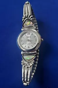 Kathy Ireland Watch Women Silver Tone Abalone Stretch Band w Abalone New Battery - Picture 1 of 7