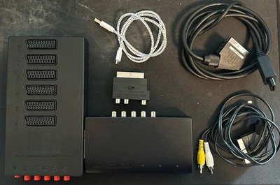 RetroTINK 5X-Pro con cables retro para juegos conmutador y cables SCART manuales Foto 1 de 4