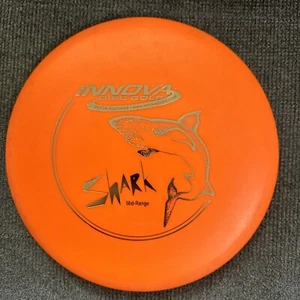 USED Innova DX Shark 173g Orange/Gold Foil Midrange Golf Disc - Picture 1 of 2