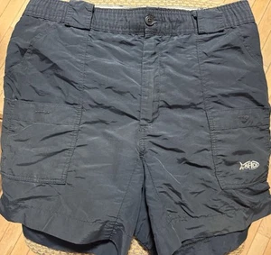 Pantalones Cortos de Rendimiento AFTCO Para Hombres Originales de Siete Bolsillos de Nylon Negros Talla 30 - Imagen 1 de 3