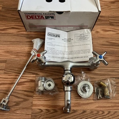 Delta 28T9 Commercial Grade Service Sink Faucet Hose End Double Handle WallMount - Image 1 of 4