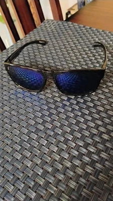 Gafas de sol Reebok para hombre diseño elegante marco negro azul lente espejo 100 % UV Foto 1 de 3