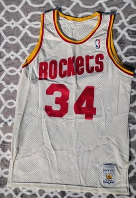 Camiseta Hakeem Olajuwon Houston Rockets Punto Arena Auténtica Casa Blanca 44 Foto 1 de 3