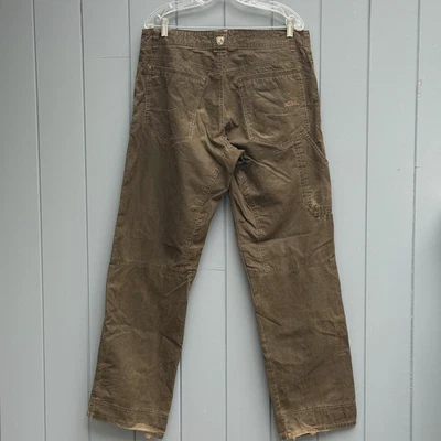 Logotipos masculinos de tecido híbrido elástico Kuhl Pants 34X32 cáqui Born in the Mountains - Imagem 1 de 4