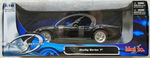 Shelby Serie 1 Negro Oro 1:18 Maisto Edición Especial Diecast Nuevo en Caja - Imagen 1 de 5