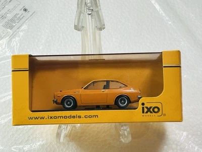 Coche modelo naranja IXO 1/43 Toyota Starlet 1200 SR 1973 - Japón Foto 1 de 4
