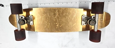 Monopatín vintage años 70 Banzai dorado aluminio Foto 1 de 4