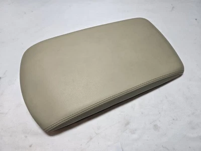Infiniti QX56 2004-2012 SEGUNDA FILA CUERO CONSOLA CENTRAL TAPA SUPERIOR BEIGE  Foto 1 de 4