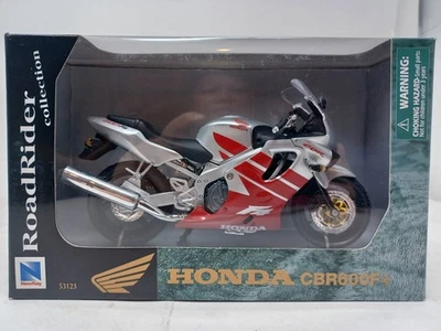 Nueva colección Ray Roadrider Honda CBR600F4 en rojo plata diecast 1:12  Foto 1 de 3