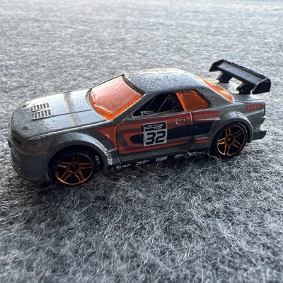Hot Wheels 2010 Mystery Pack Chrome Orange Nissan Skyline GT-R (R32) Protector - Image 1 of 4