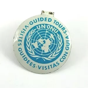 Spilla bottone metallo pieghevole vintage Nazioni Unite UN-ONU - visite guidate - linguetta. 0,75" - Foto 1 di 3
