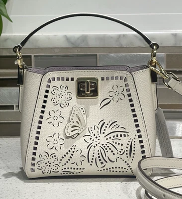 KATE SPADE PHOEBE MINI SATCHEL CROSSBODY LEATHER BUCKET BAG FLORAL CUT OUT CREAM - Image 1 of 4