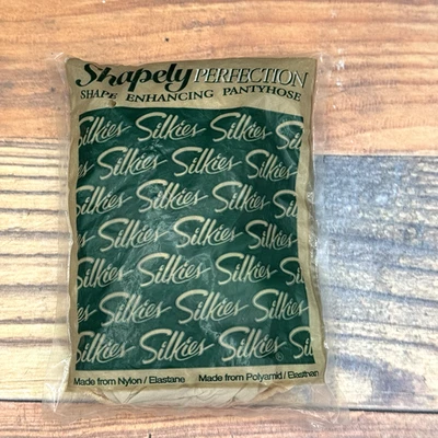 Pantimedias Silkies Shapely Perfection X-Tall Off-White Marfil 46-48 EE. UU. 149 Foto 1 de 3