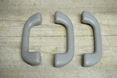 JUEGO DE 3 MANIJAS DE AGARRE DE TECHO INTERIORES DELANTERAS Y TRASERAS GRISES KIA OPTIMA OEM Foto 1 de 4