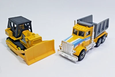 Matchbox 1981 Peterbilt Dump Truck and 1979 Caterpillar D9 Bulldozer 1/64 - Image 1 of 4