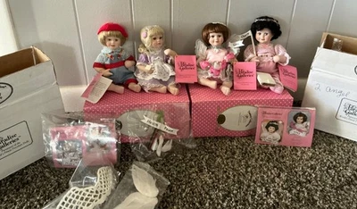 Paradise Galleries Porcelain Dolls 4 Love-Peace-Health-Charity 1999 - Image 1 of 4