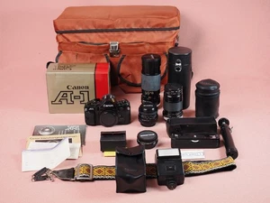 Canon A-1 35mm SLR Camera FD Tokina 28mm f2.8 Power Winder Flash Manuals Tested - Picture 1 of 23