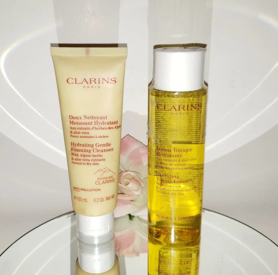Limpiador en espuma suave hidratante Clarins 4,2 oz o loción tonificante 6,7 oz TÚ ELIGES Foto 1 de 1