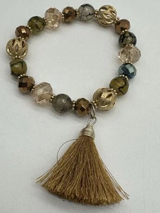 Beautiful Beaded Stretch Bracelet With Gold Tone And Tassel Accent - Picture 1 of 5