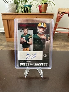 2023 Panini Rookies & Stars - Dress For Success #DS-SC Sean Clifford /99 Packers - Bild 1 von 2