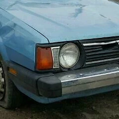 Subaru: 1980, 1981, With Round Headlights, Right Headlight Bezel With Two Lights - Image 1 of 4