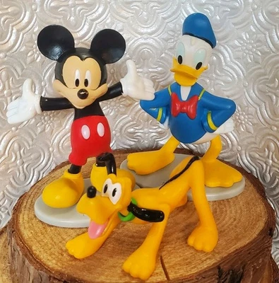 Figuras de vinilo de PVC Just Play Disney Mickey Mouse y Lucas Pato y Plutón  Foto 1 de 4
