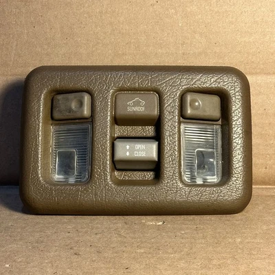 Interruptor de control de techo corredizo eléctrico OEM Isuzu Trooper 1992-2002 marrón luz domo lámpara Foto 1 de 4