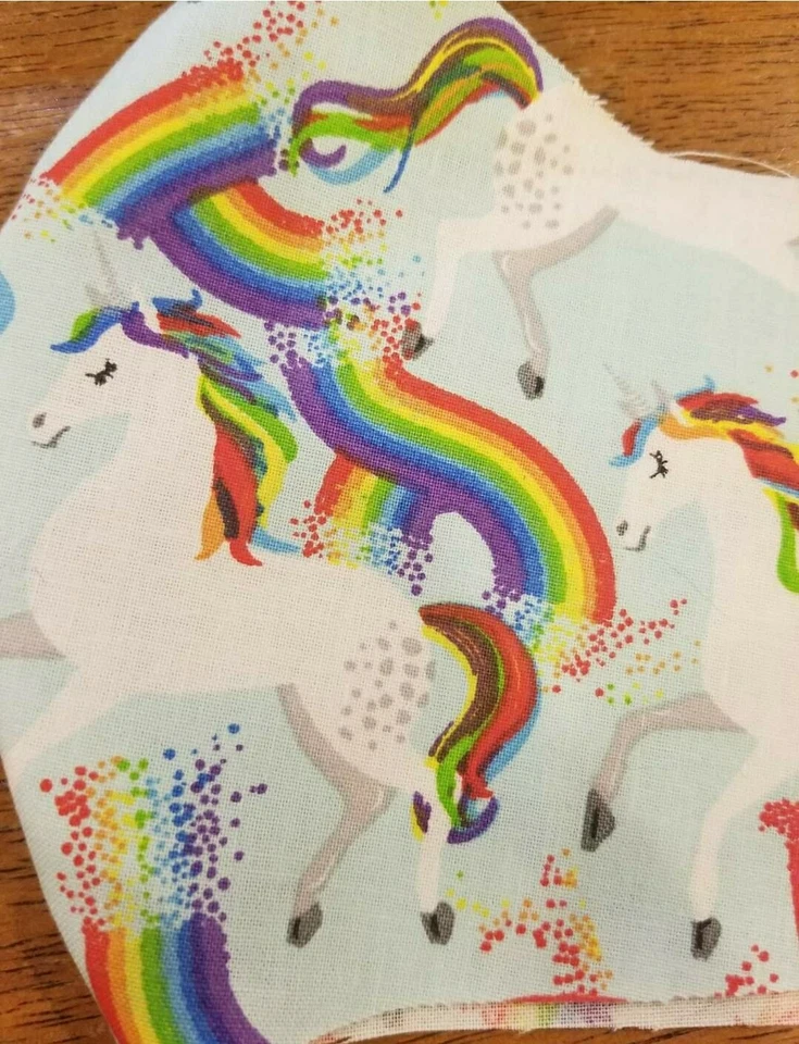 Reversible Adult unicorns with purple mask - Image 1 of 1