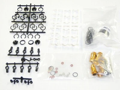 Новый ассоциированный комплект амортизаторов RC10DS передние и задние золотистые AG19 - Изображение 1 из 3