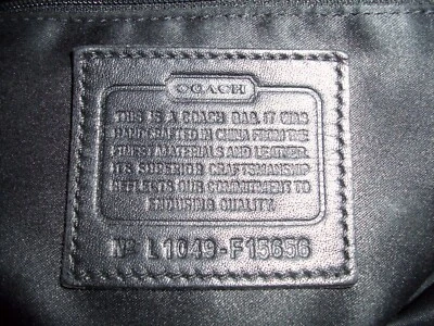 Bolso de hombro Coach Horse Carriage Ashley con adornos de cuero de tela negra y tostada F15656 Foto 1 de 4