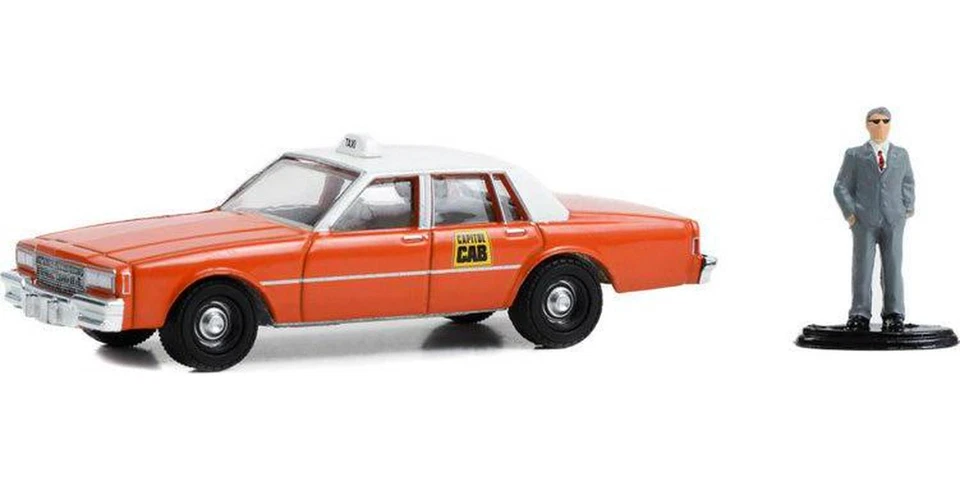 1981 Chevrolet Impala Capitol Cab Taxi w/ Man in Suit (The Hobby Shop) Series 15 - Image 1 of 1