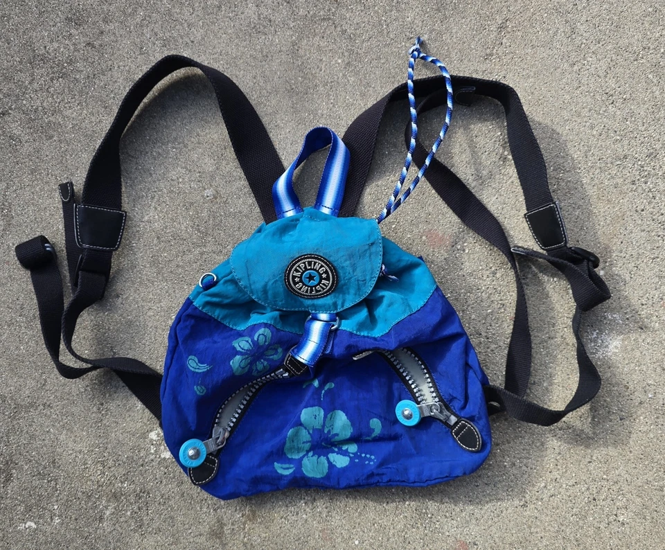 Mochila con cordón azul hawaiano Kipling vintage años 90 con cremalleras ajustables Foto 1 de 4
