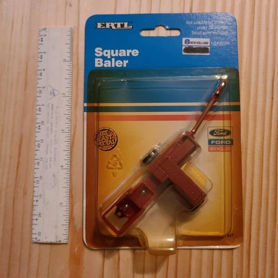 Empacadora cuadrada Ford New Holland 1991 diecast ERTL #337 vintage sellada escala 1/64 Foto 1 de 4