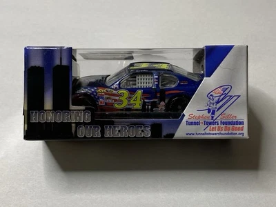 1/64 NASCAR Diecast 2011 David Gilliland #34 Honoring Heros Stephen Siller Ford Foto 1 de 3