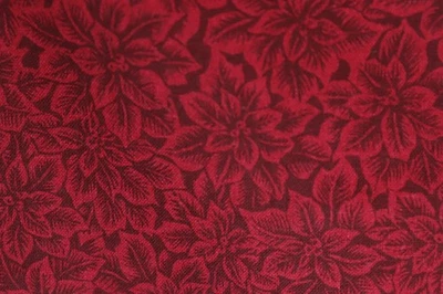 110"L x 44"W Tela Reino Margarita Tono sobre Tono Embalado Rojo Flores de Pascua Foto 1 de 4