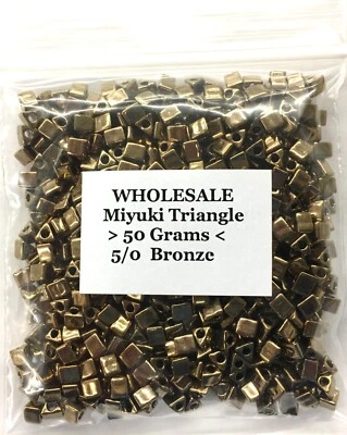 Wholesale 50 GRAMS Bronze Miyuki Sharp Triangle Beads 5/0 #457 - Image 1 of 3
