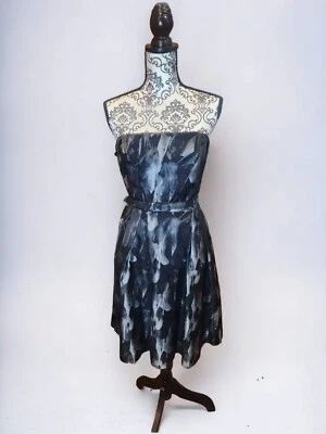 Vestido de fiesta sin tirantes negro/plateado White House Black Market con bolsillos talla 8 Foto 1 de 4