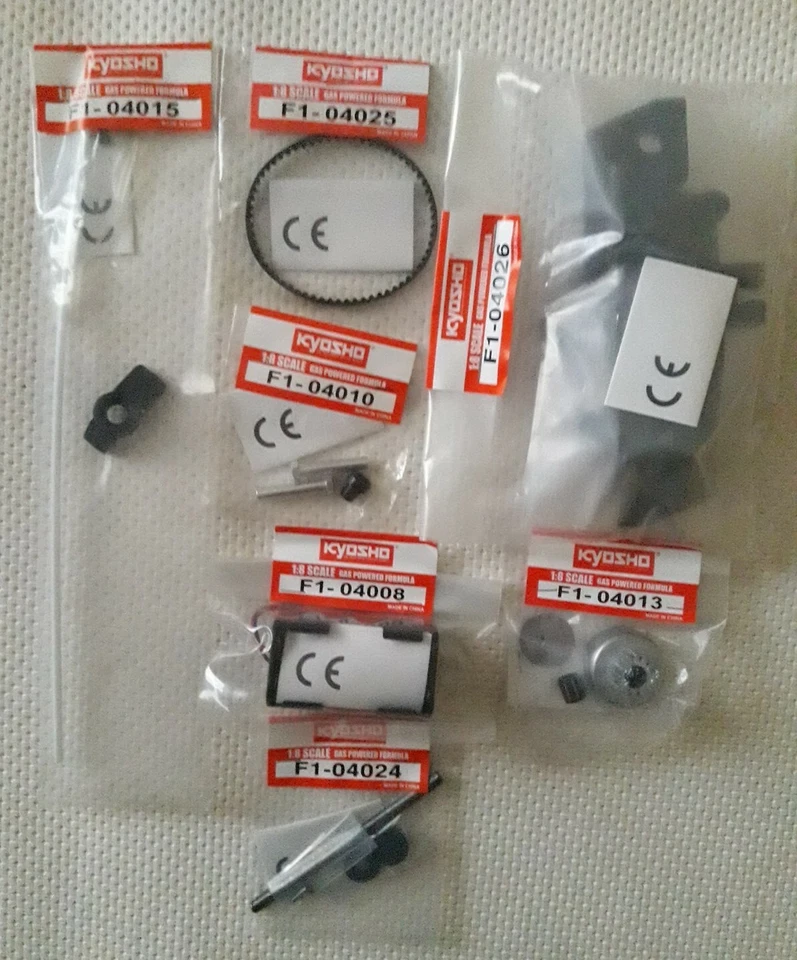 Kyosho 1/8 Ferrari F1 2004 Lotto di N°7 componenti vari. "Nuovi sigillati"  - Immagine 1 di 1
