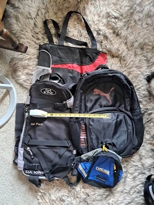 Lot Of 4 Bags DAKINE HELI Puma Camel Backpack Fanny pack Needs repair - Imagem 1 de 4