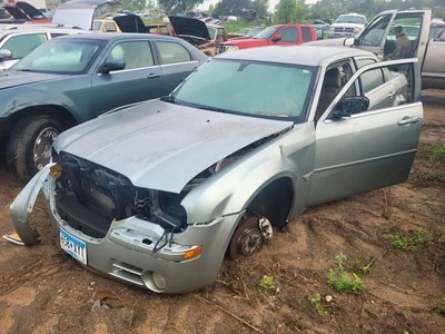 Regulador de ventana trasera del conductor incluye motor para 05-10 300  Foto 1 de 4