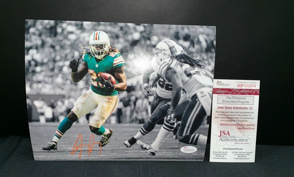 JAY AJAYI MIAMI DOLPHINS SIGNED 8X10 PHOTO WITNESS JSA COA WP302674 - Image 1 of 1