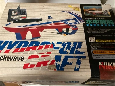 Vintage Nikko Shockwave RC Rennboot Ferngesteuertes Tragflächenboot fehlendes Ladegerät Schläger - Bild 1 von 4